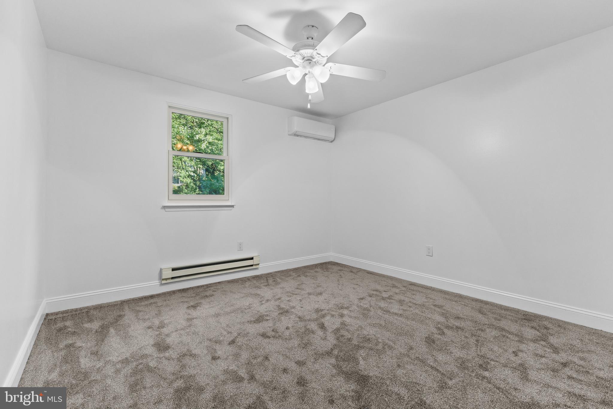 4103 Forrest Road Mount Joy, PA 17552 - Photo 26 of 50 an empty room with windows and ceiling fan