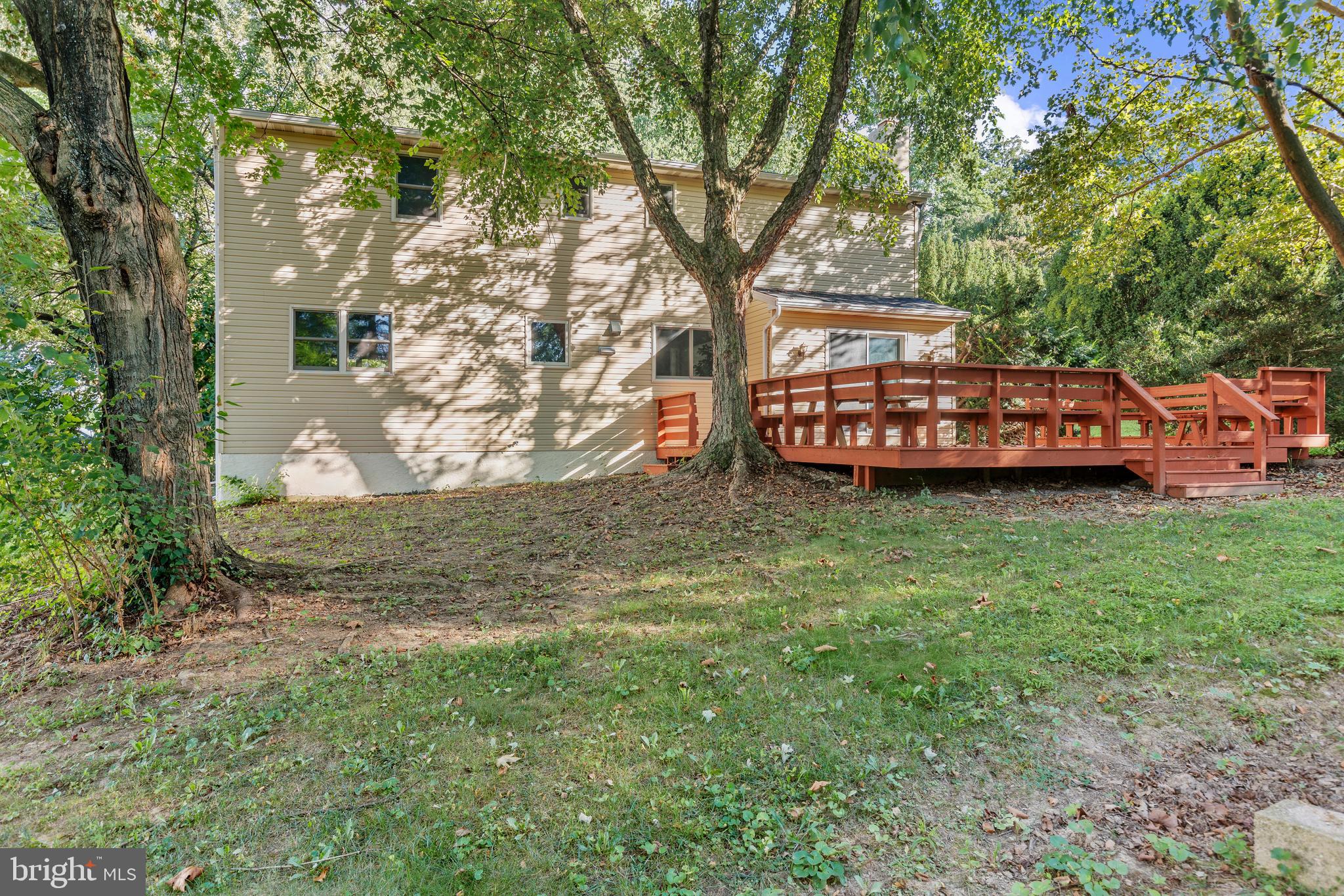 4103 Forrest Road Mount Joy, PA 17552 - Photo 42 of 50 a view of a wooden house with a big yard and large trees