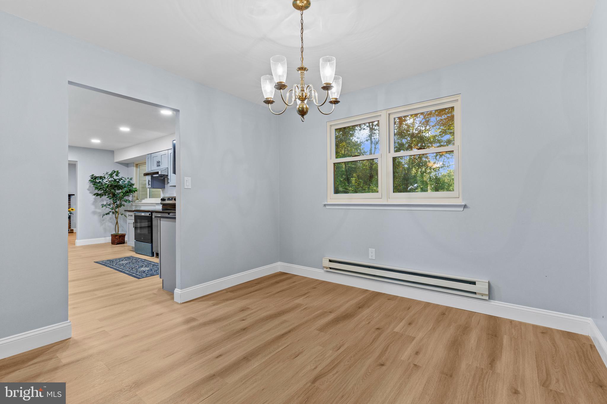 4103 Forrest Road Mount Joy, PA 17552 - Photo 9 of 50 wooden floor in an empty room with a window