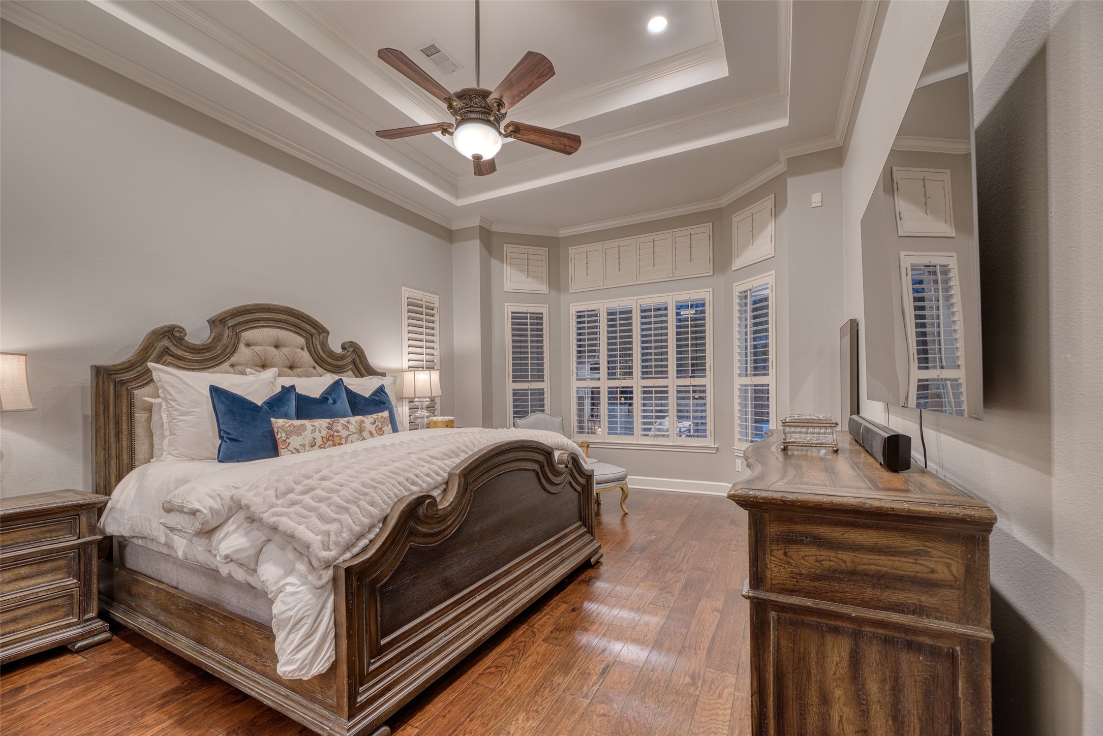19522 Tamarack Way Houston, TX 77094 - Photo 22 of 50 a bedroom with a bed and a chandelier