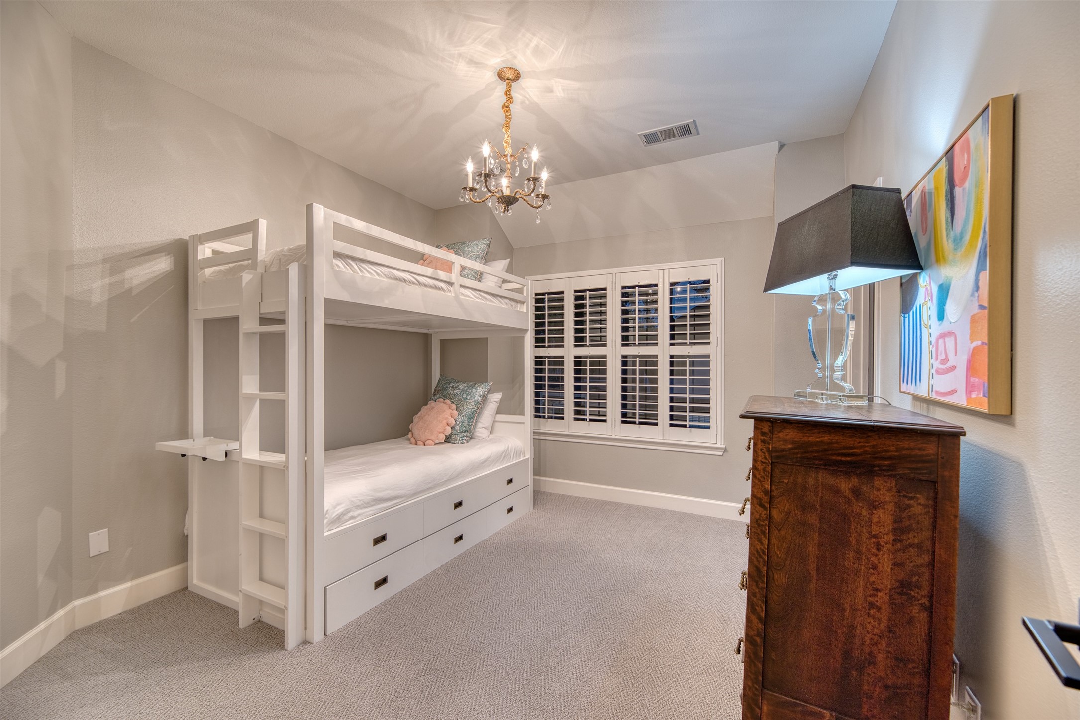 19522 Tamarack Way Houston, TX 77094 - Photo 32 of 50 a bedroom with chandelier and wooden floor