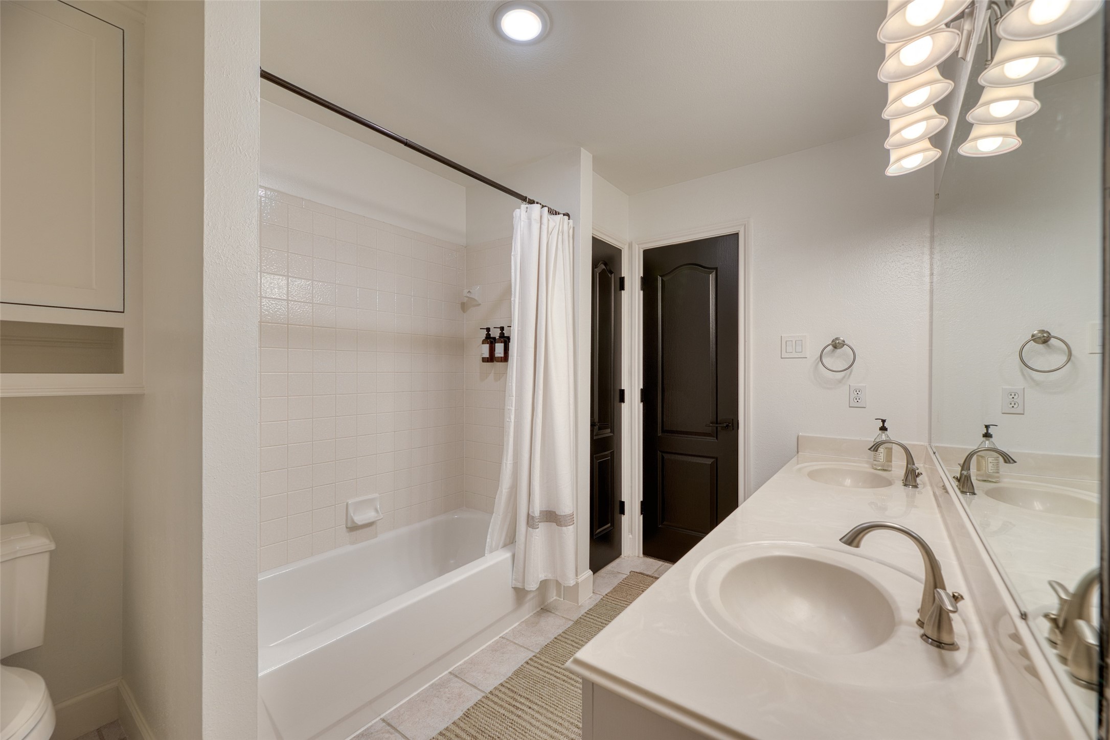 19522 Tamarack Way Houston, TX 77094 - Photo 33 of 50 a bathroom with a sink and a mirror