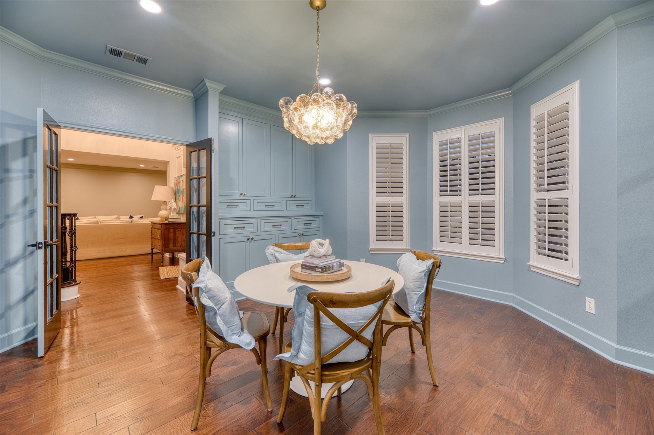 19522 Tamarack Way Houston, TX 77094 - Photo 7 of 50 a dining room with furniture a chandelier and wooden floor
