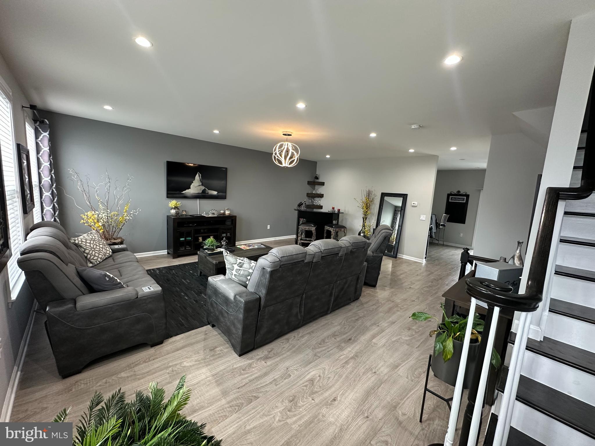 20 Canter Place Chesterfield, NJ 08515 - Photo 11 of 31 a living room with furniture and a wooden floor