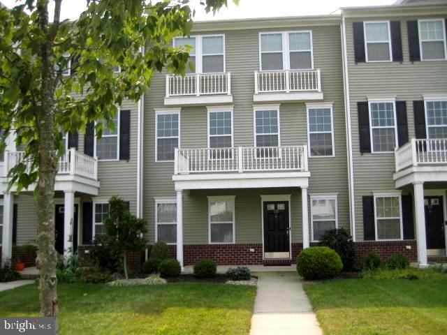 20 Canter Place Chesterfield, NJ 08515 - Photo 2 of 31 a front view of a house with a yard and plants