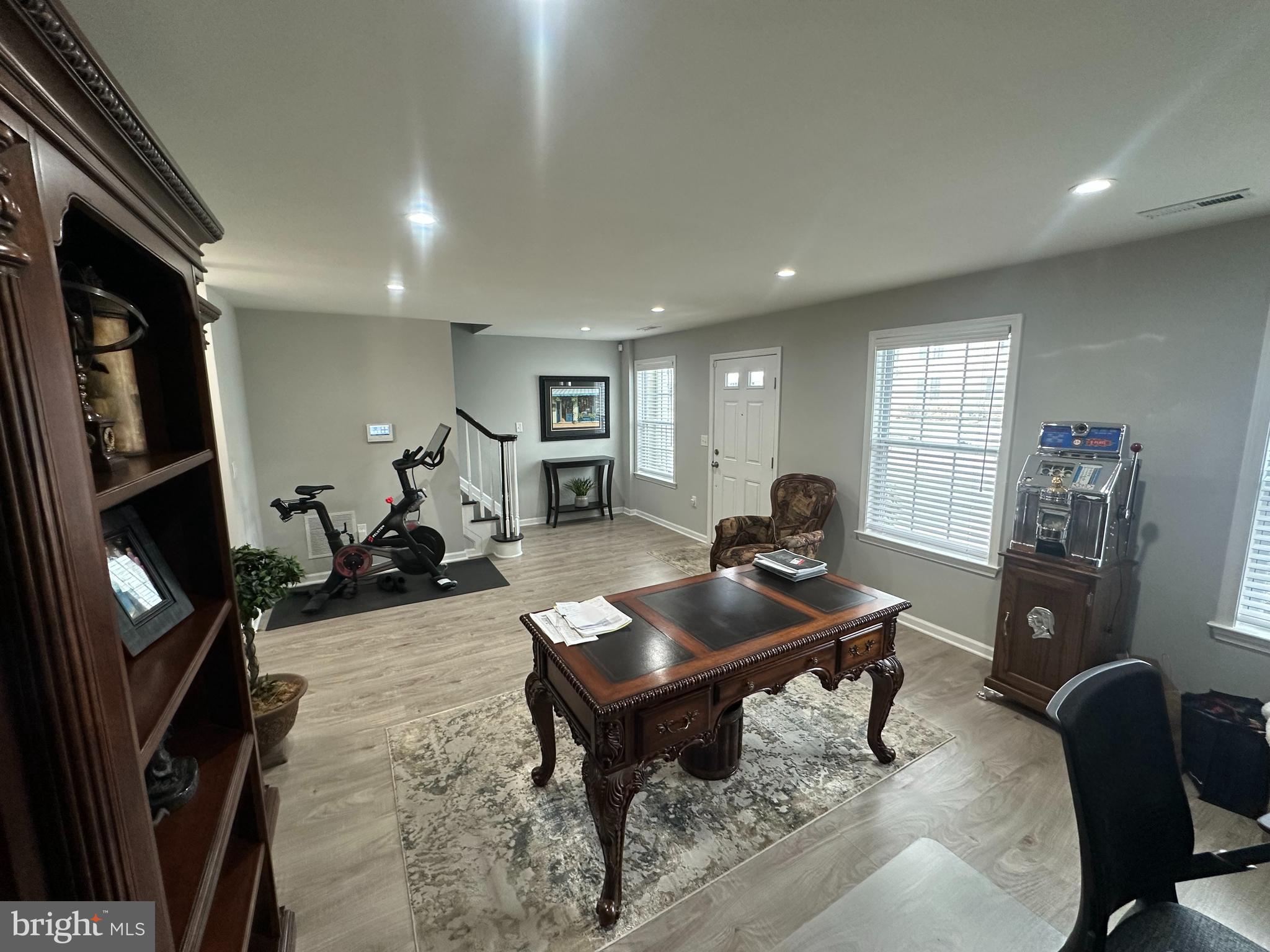 20 Canter Place Chesterfield, NJ 08515 - Photo 8 of 31 a living room with furniture a window and gym equipment