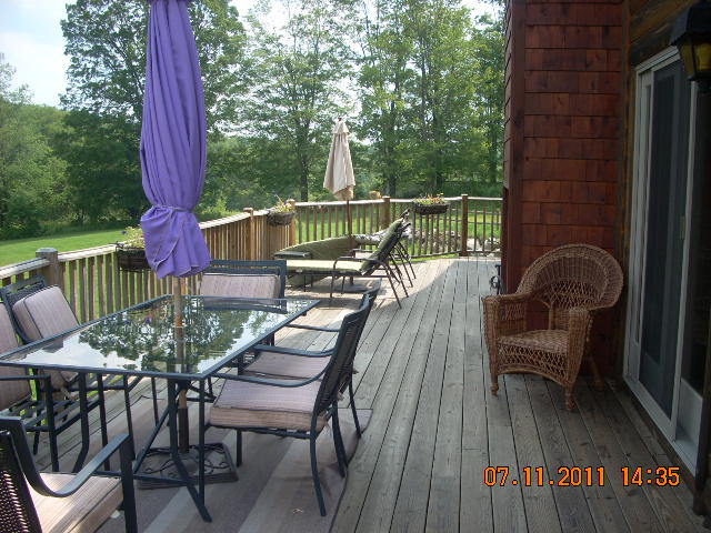 49 S Road Peru, MA 01235 - Photo 15 of 21 a view of a chairs and table on the deck