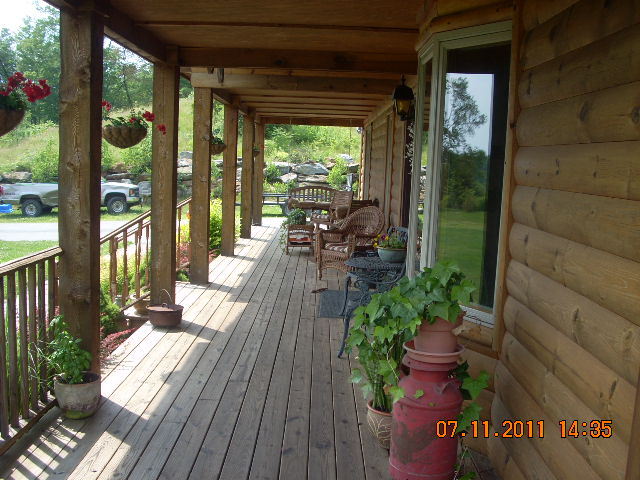 49 S Road Peru, MA 01235 - Photo 16 of 21 a view of a porch with wooden floor