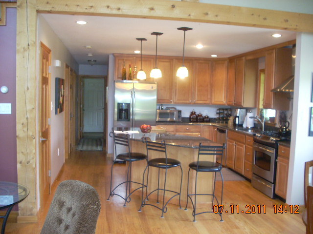 49 S Road Peru, MA 01235 - Photo 4 of 21 a kitchen with dining table and chairs