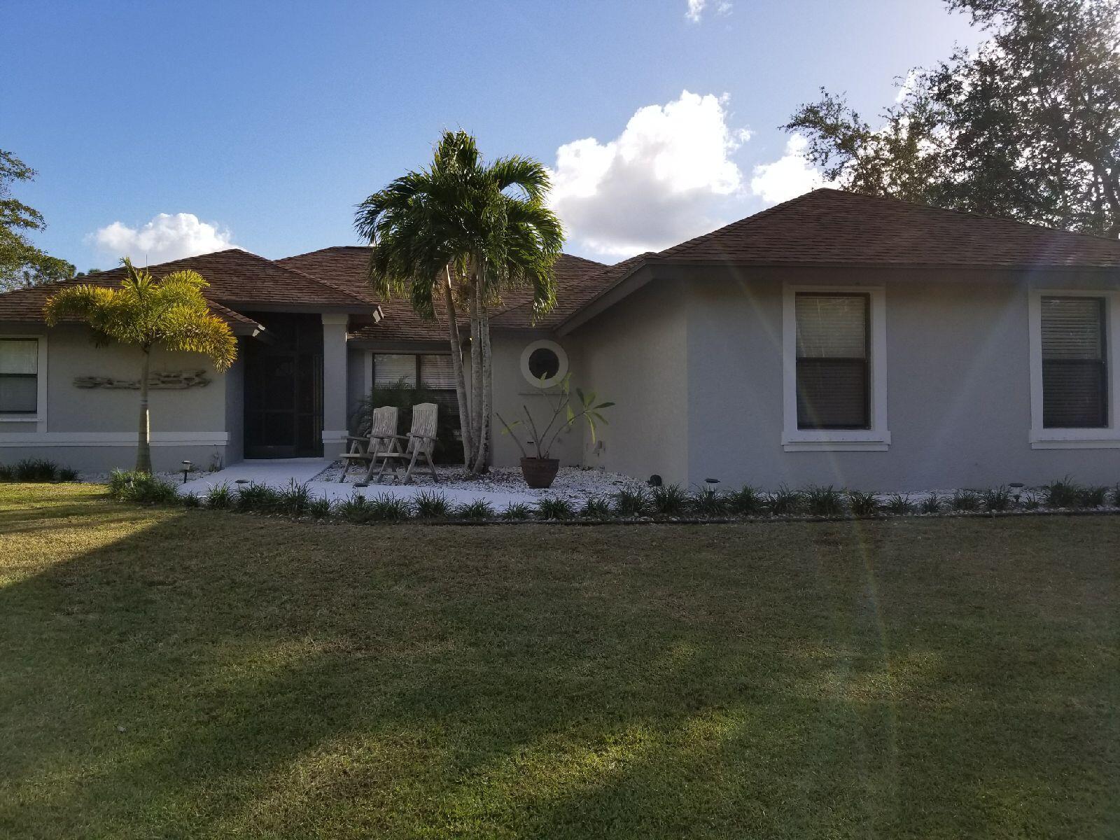 12386 170th Road North Jupiter, FL 33478 - Photo 2 of 21 Front Exterior Y