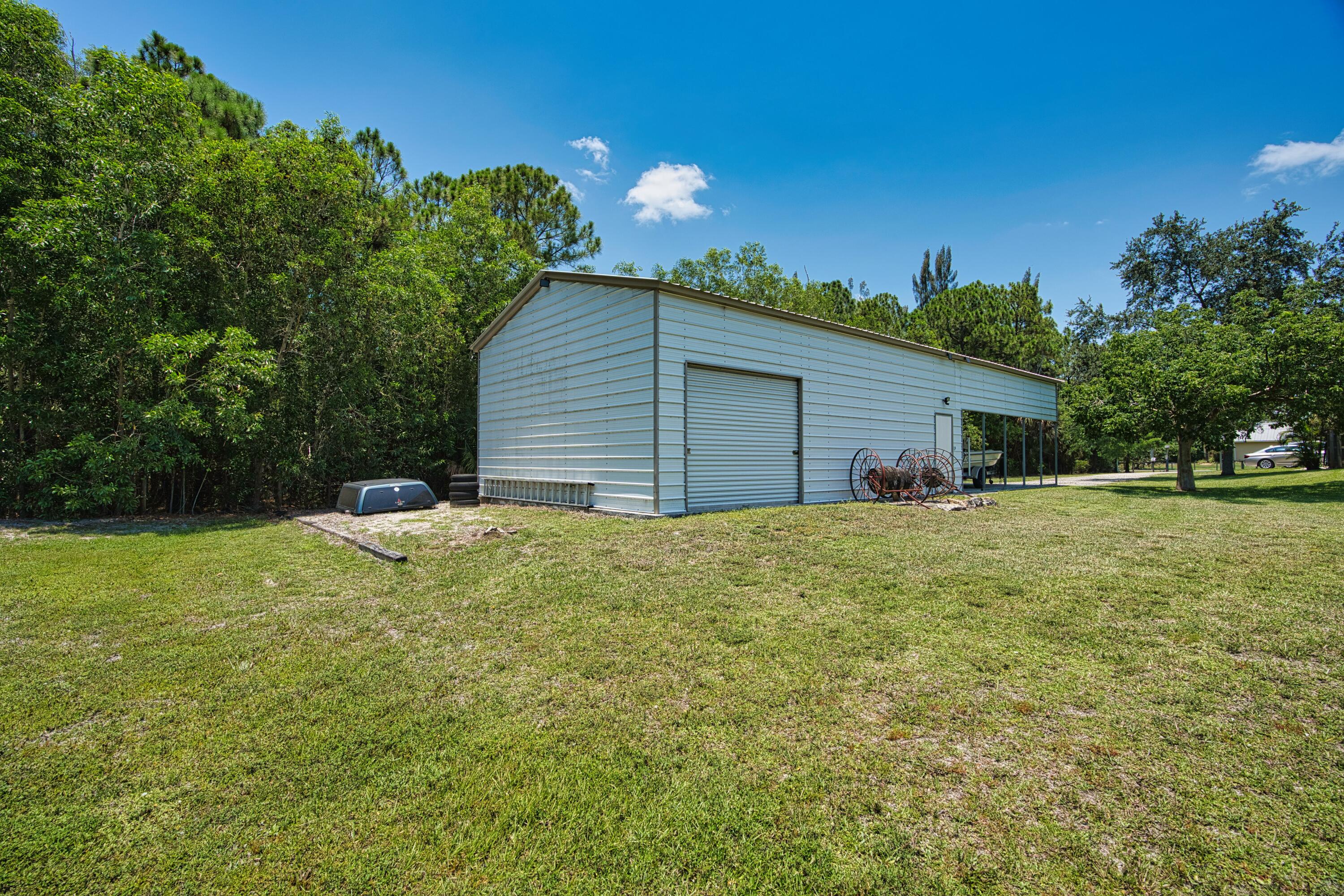 12386 170th Road North Jupiter, FL 33478 - Photo 21 of 21 Y Workshop Side