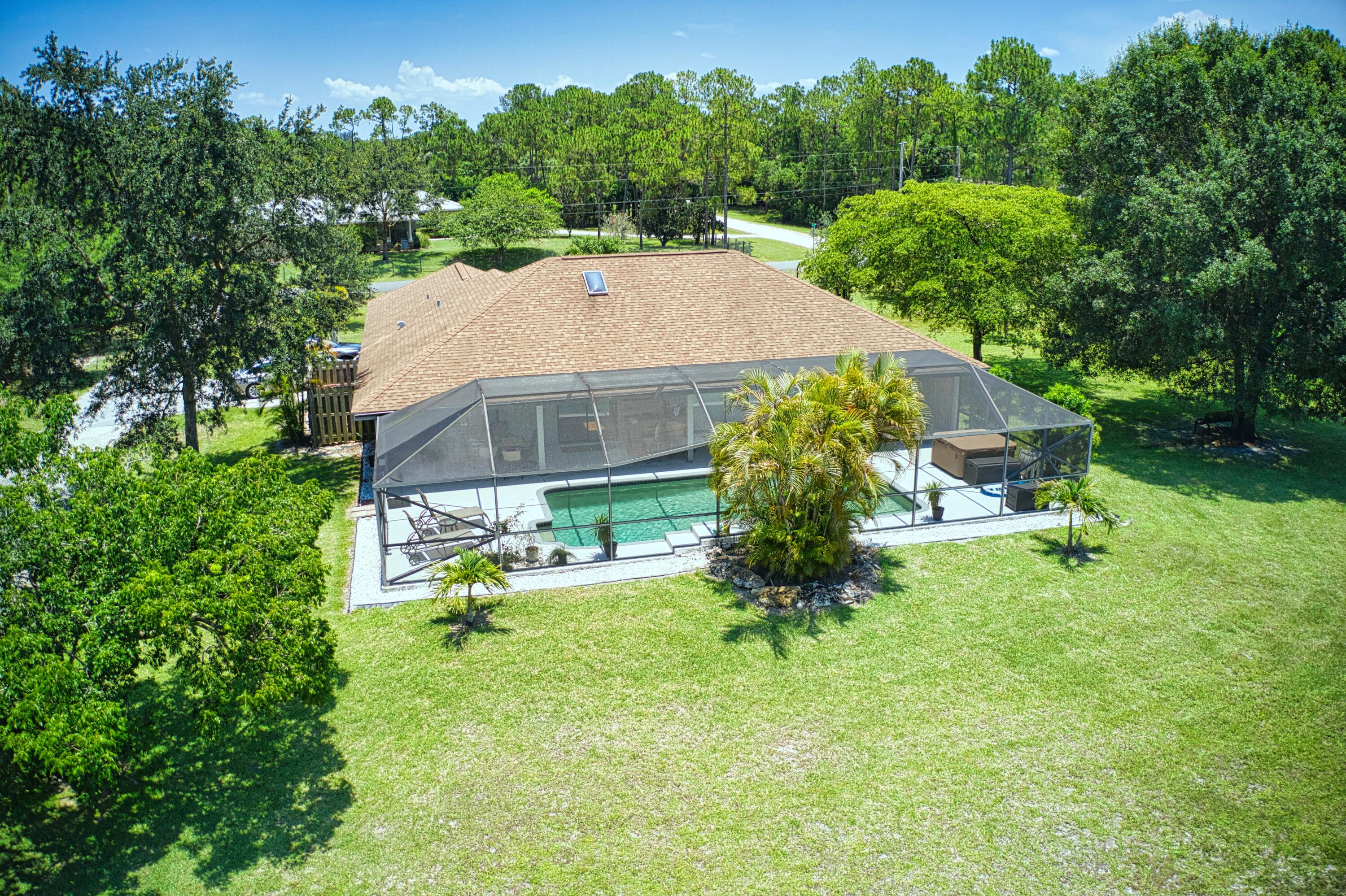 12386 170th Road North Jupiter, FL 33478 - Photo 4 of 21 Y Pool - Back