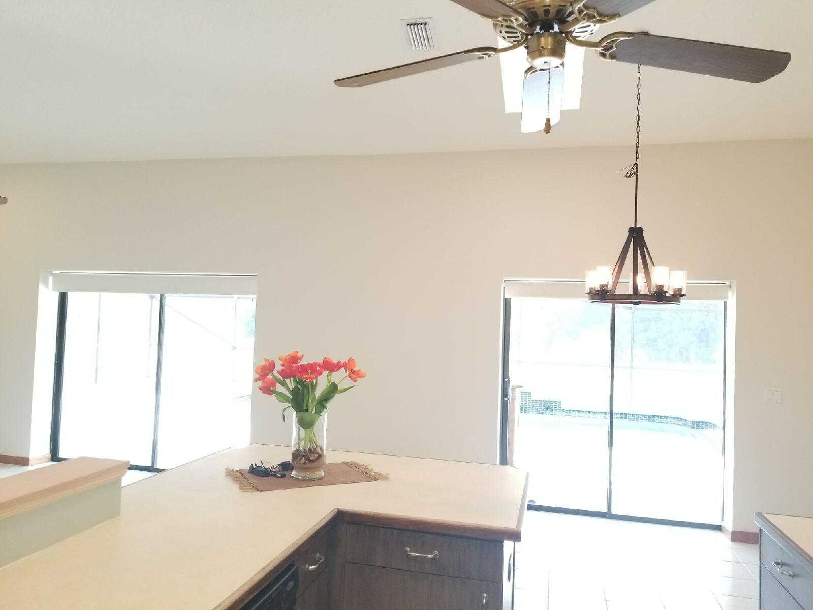 12386 170th Road North Jupiter, FL 33478 - Photo 9 of 21 Kitchen Yard view