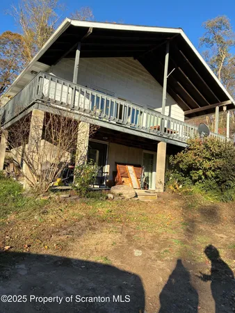 a view of a house with a balcony