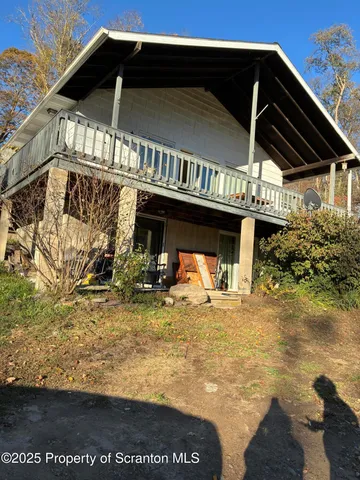 a view of a house with a balcony