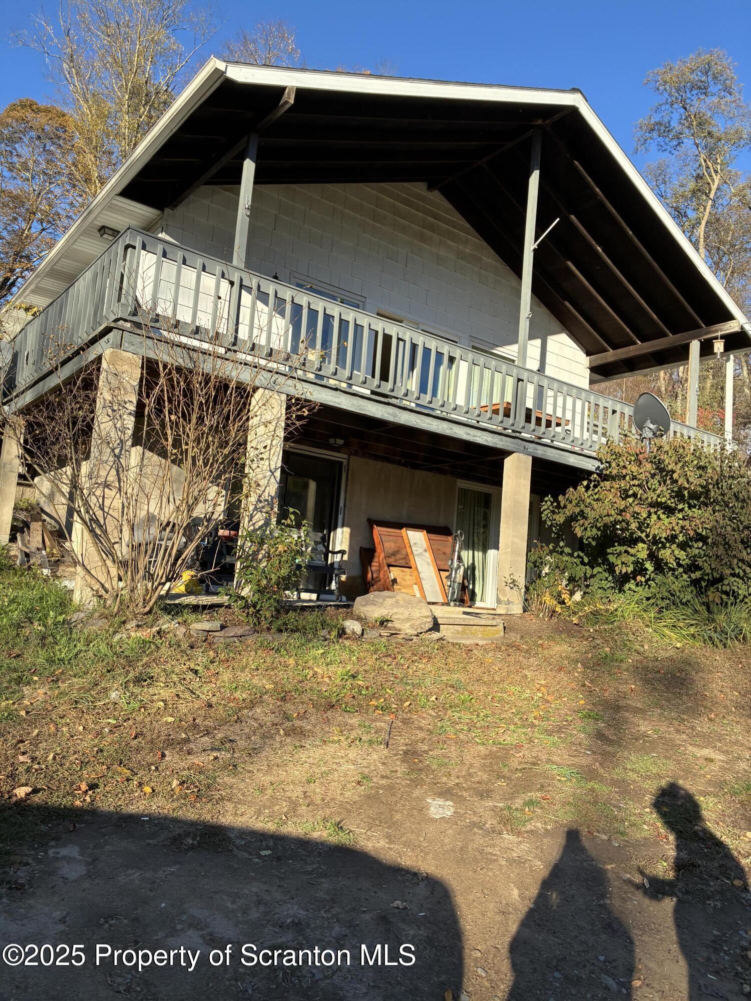 6295 Highway 706 Montrose, PA 18801 - Photo 3 of 11 a view of a house with a balcony