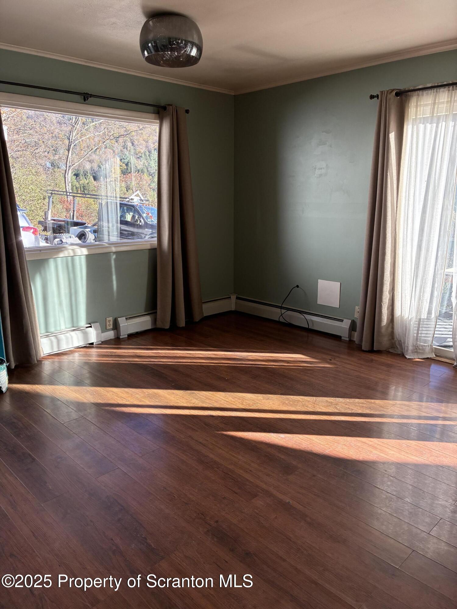 6295 Highway 706 Montrose, PA 18801 - Photo 8 of 11 a view of room with window and floor
