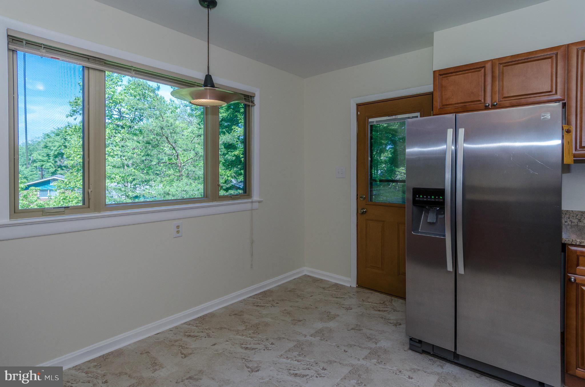 11524 Colt Terrace Silver Spring, MD 20902 - Photo 10 of 27 Table Space with View