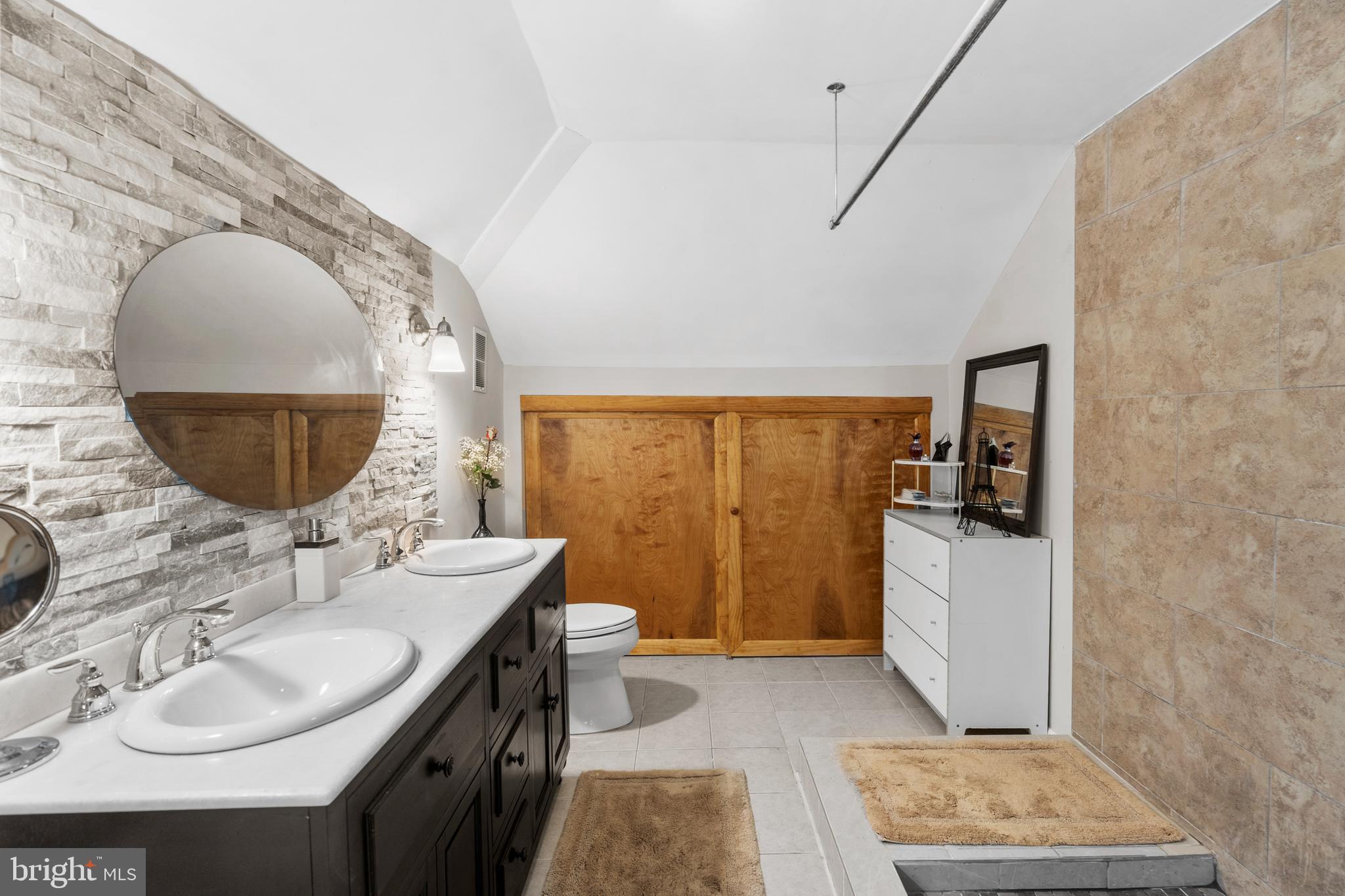 1118 Allston Road Havertown, PA 19083 - Photo 37 of 58 a bathroom with a sink and a mirror