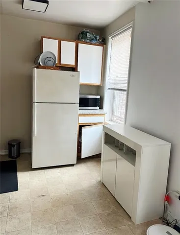 a utility room with washer and dryer