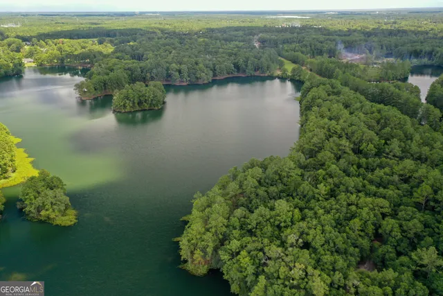 a view of swimming pool with a yard