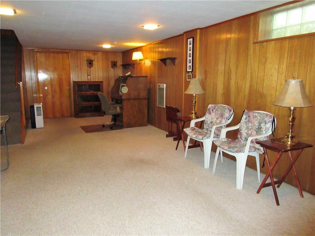 182 Ford City Road Freeport, PA 16229 - Photo 12 of 24 This 29x13 family room includes a brick, wood burning fireplace and recessed lighting.