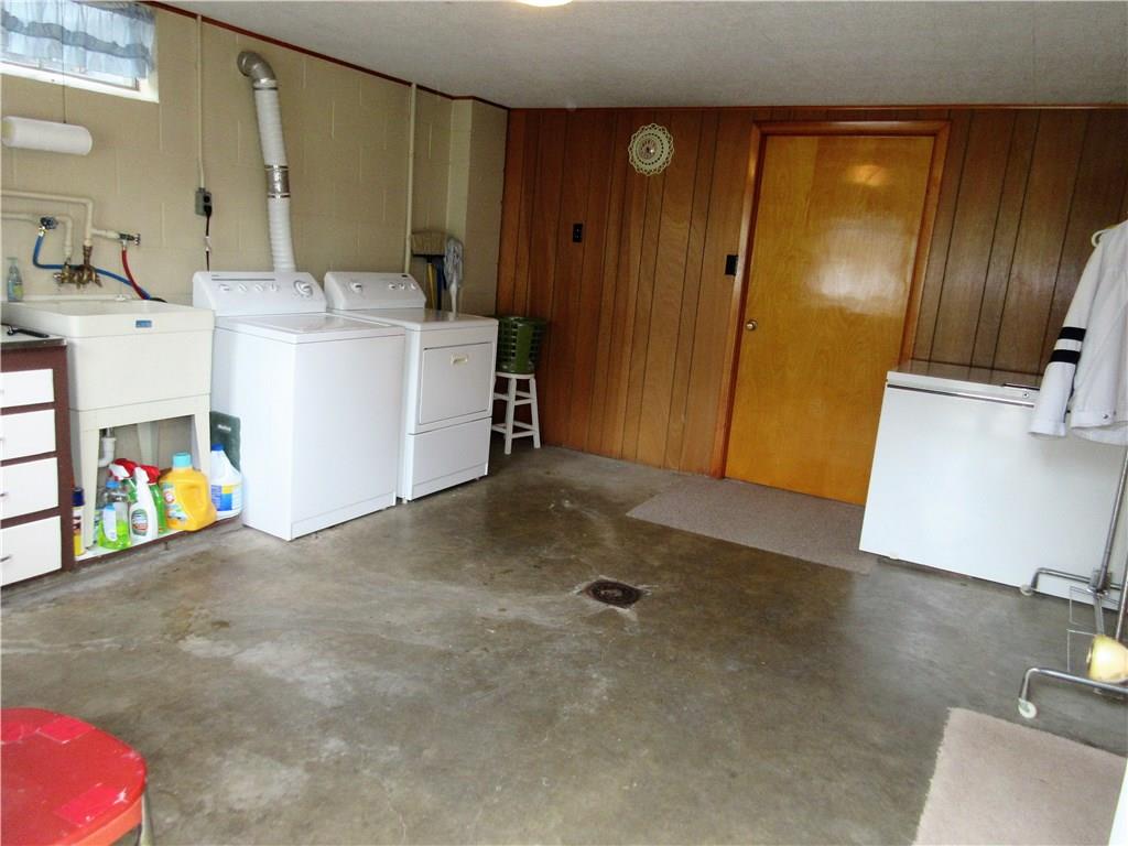 182 Ford City Road Freeport, PA 16229 - Photo 14 of 24 This very large laundry room has built in cupboards and counters.