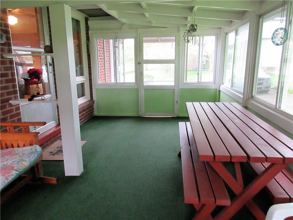 182 Ford City Road Freeport, PA 16229 - Photo 15 of 24 This 8x10 enclosed sunroom features windows all around with great views to the back and side yards.