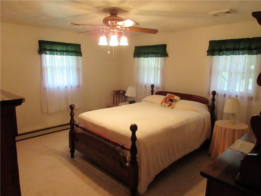 182 Ford City Road Freeport, PA 16229 - Photo 7 of 24 The master bedroom features plenty of room, double closets, and a ceiling fan with light.