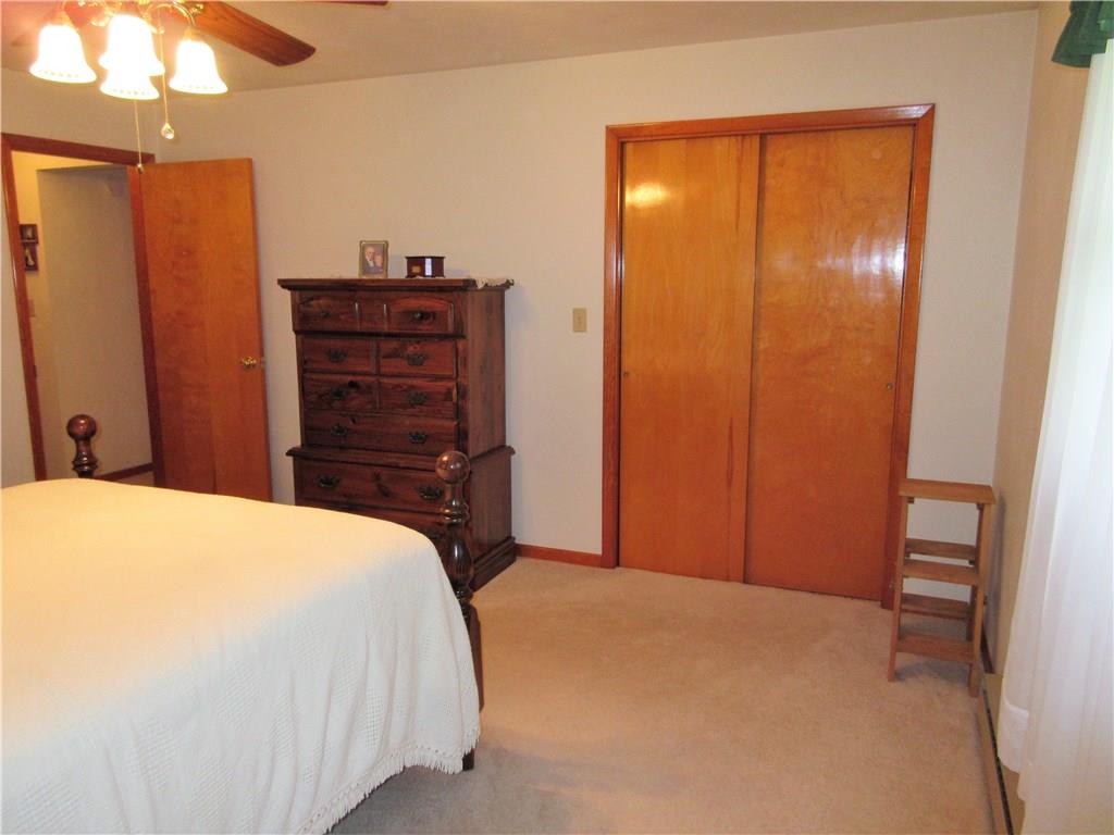 182 Ford City Road Freeport, PA 16229 - Photo 8 of 24 The master bedroom features plenty of room, double closets, and a ceiling fan with light.