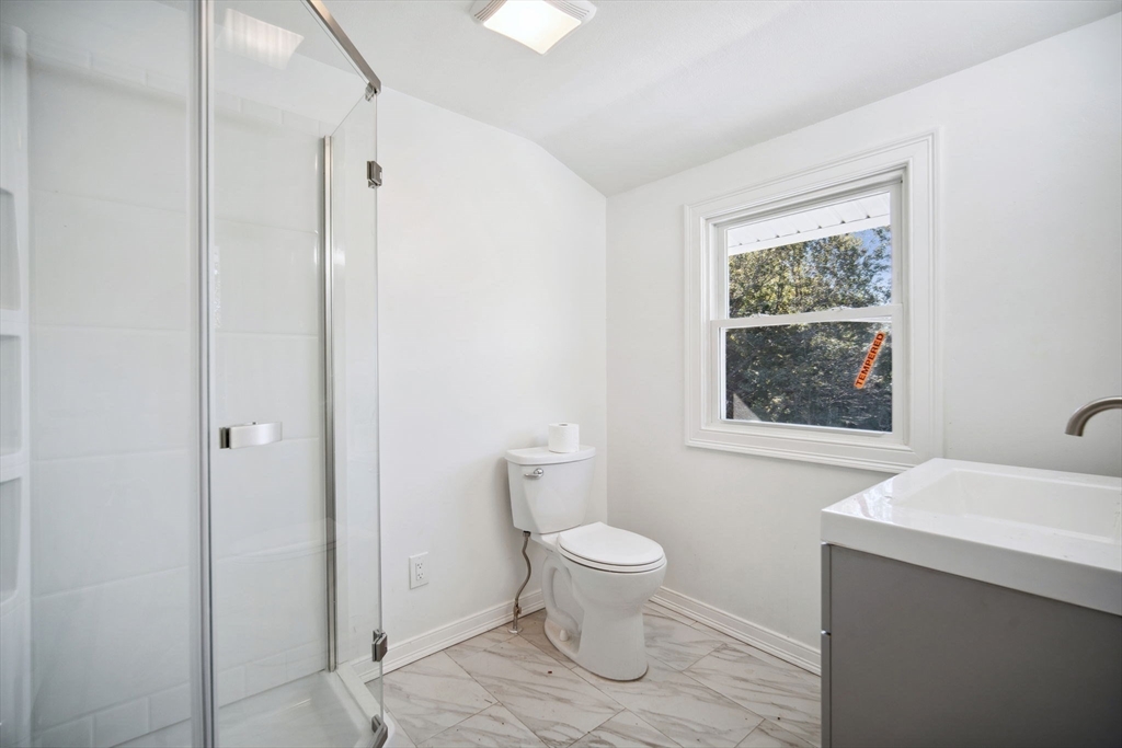 154 County Road Southampton, MA 01073 - Photo 36 of 42 a bathroom with a toilet sink and window