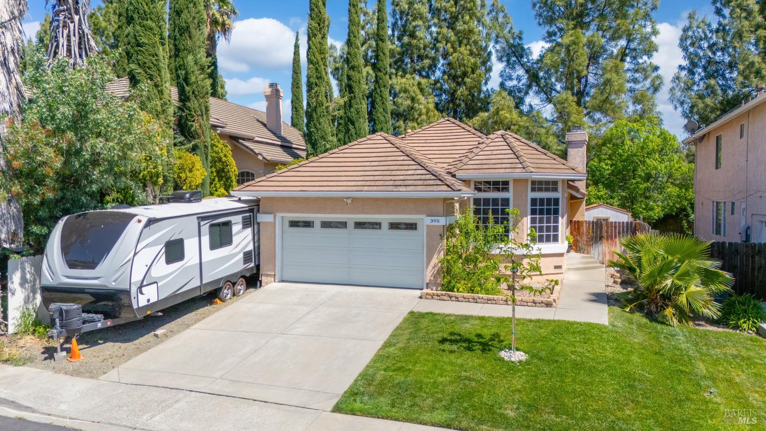 395 Bald Eagle Drive Vacaville, CA 95688 - Photo 1 of 1 a front view of a house with garden