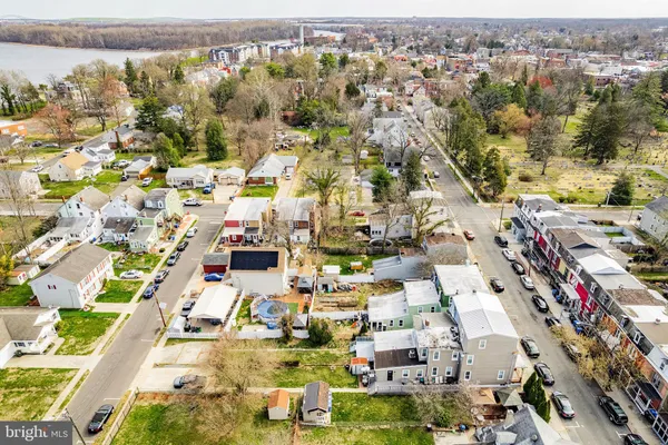 an aerial view of residential building and parking space