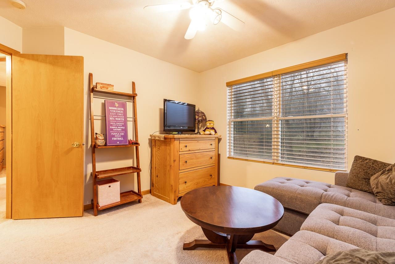 643 Knollwood Road Davis, IL 61019 - Photo 12 of 26 a bedroom with furniture and a window