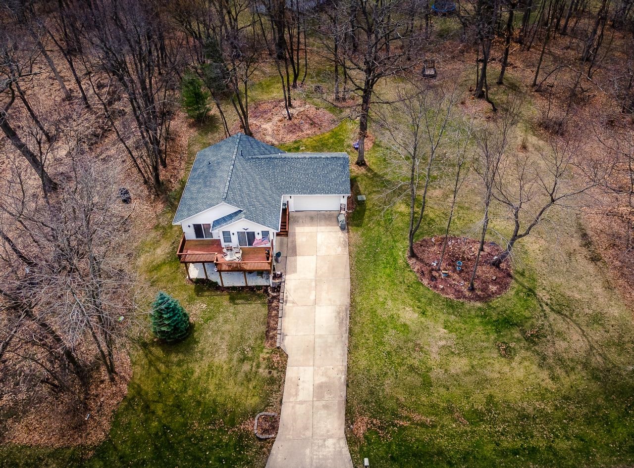 643 Knollwood Road Davis, IL 61019 - Photo 24 of 26 a view of a house with a yard