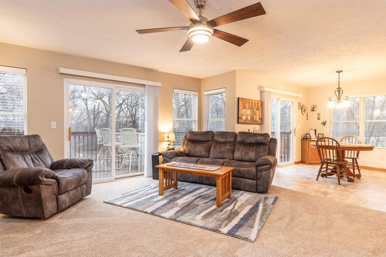 643 Knollwood Road Davis, IL 61019 - Photo 3 of 26 a living room with furniture and a large window