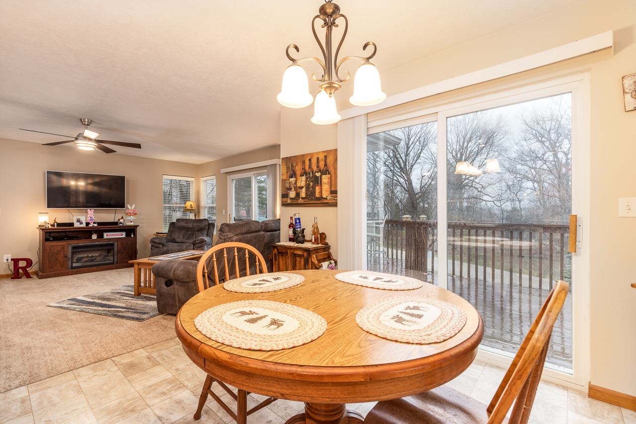 643 Knollwood Road Davis, IL 61019 - Photo 8 of 26 a view of a dining room with furniture window and outside view