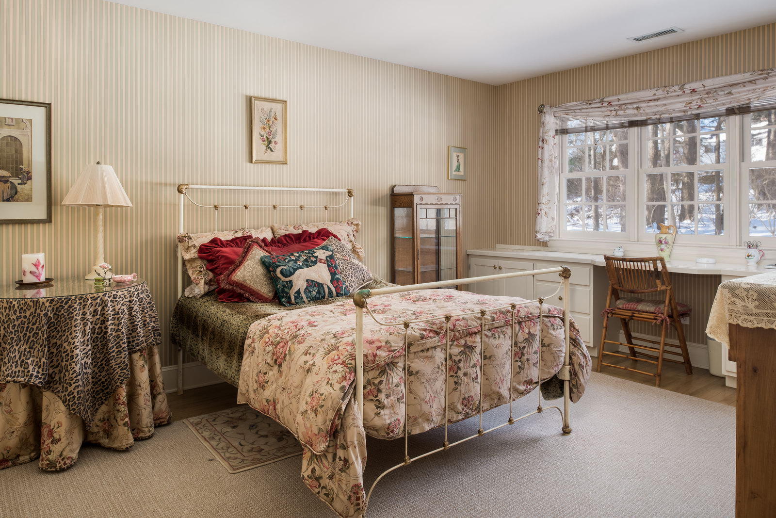 8 Priscilla Lane Darien, CT 06820 - Photo 12 of 37 a bedroom with a bed and a chandelier