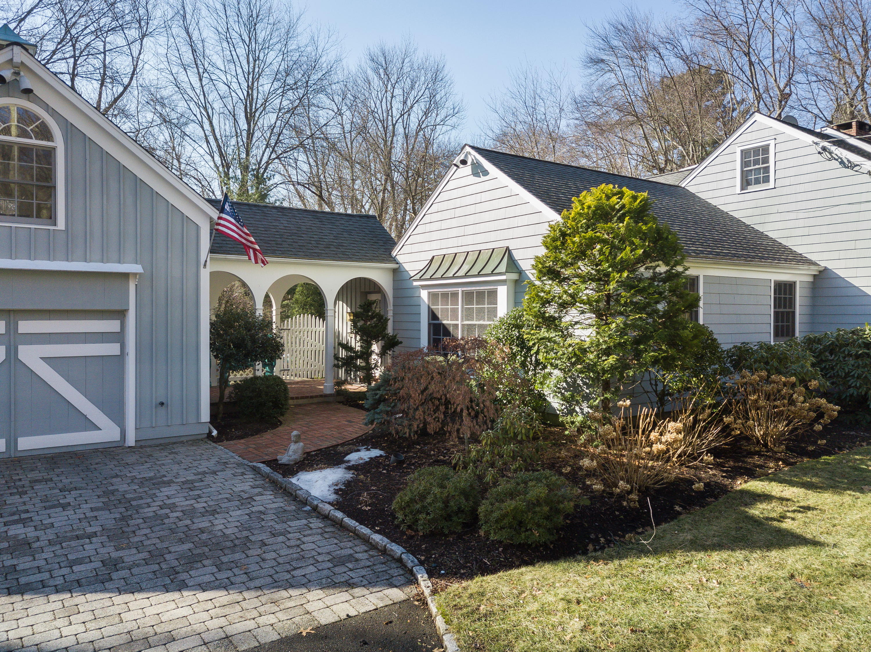 8 Priscilla Lane Darien, CT 06820 - Photo 18 of 37 a view of a house with a yard