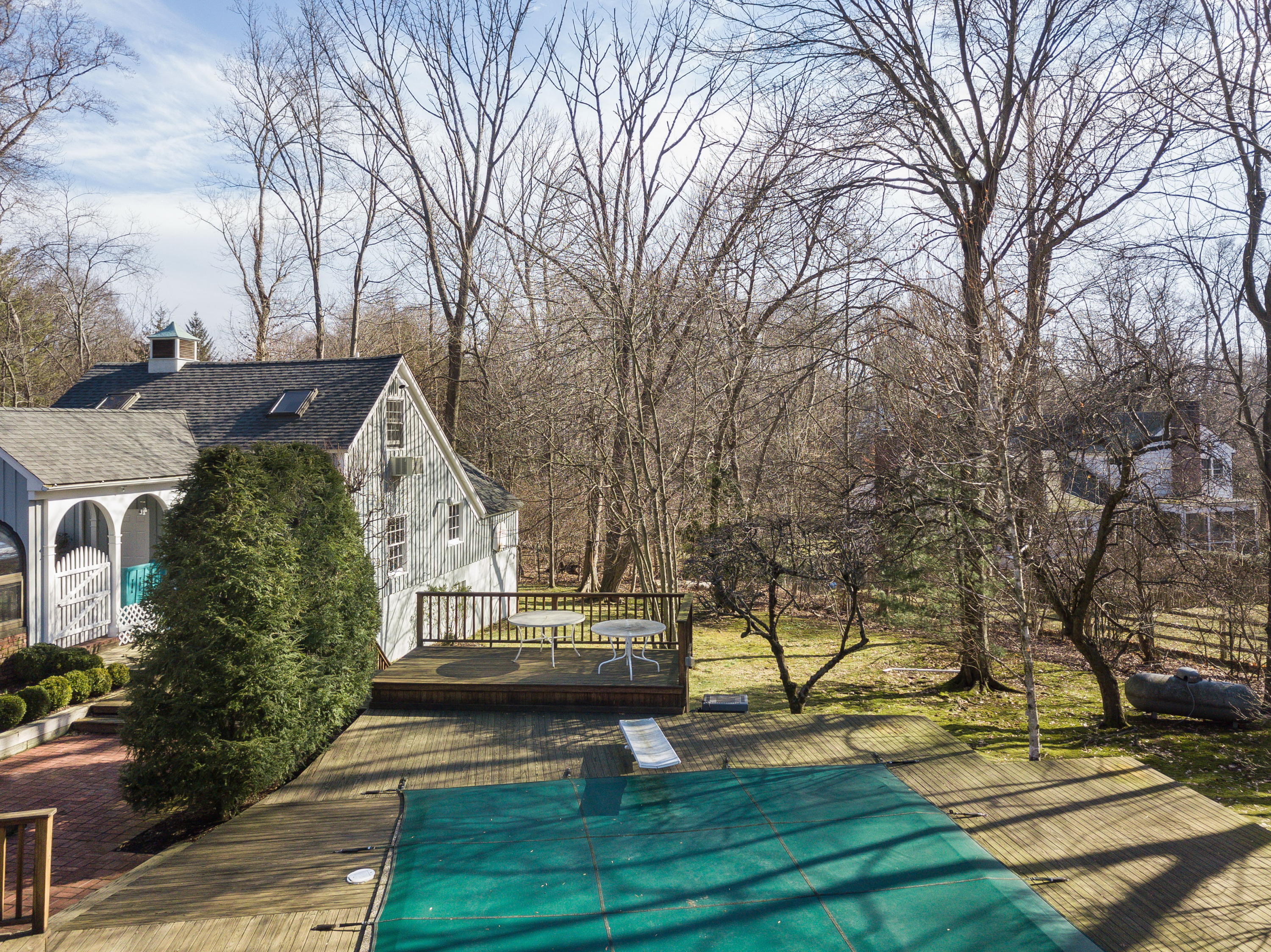 8 Priscilla Lane Darien, CT 06820 - Photo 21 of 37 a view of house with outdoor space and sitting area