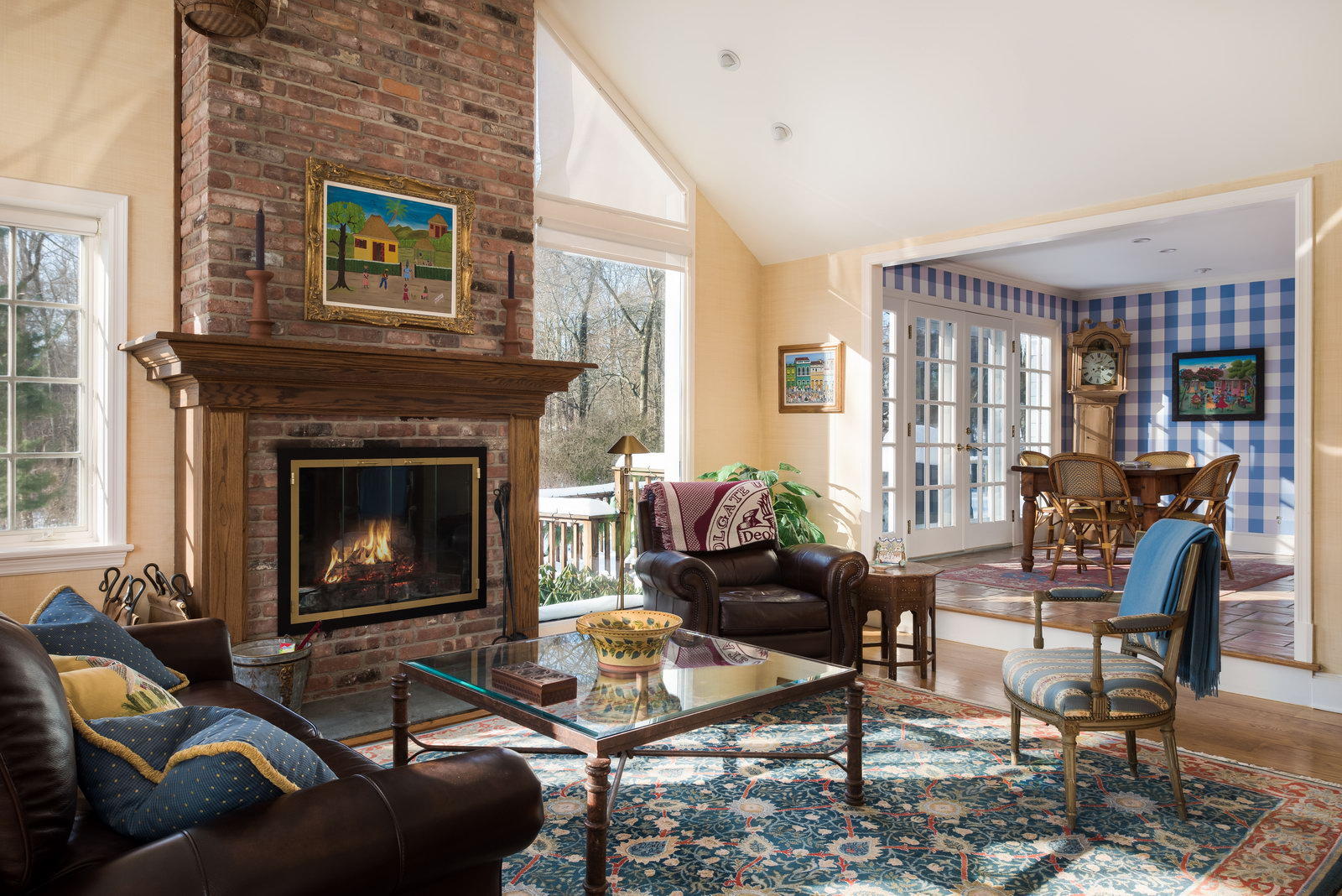 8 Priscilla Lane Darien, CT 06820 - Photo 5 of 37 a living room with furniture a large window and a fireplace