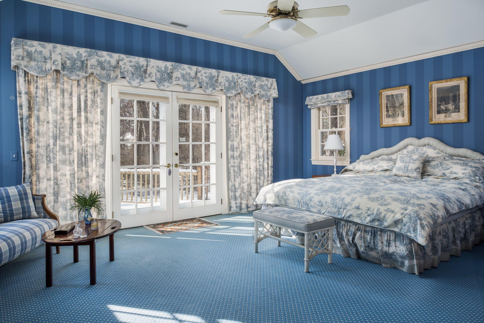 8 Priscilla Lane Darien, CT 06820 - Photo 10 of 37 a spacious bedroom with a bed and a couch