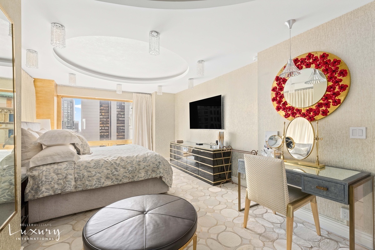 Undisclosed Address Manhattan, NY 10022 - Photo 11 of 16 a living room with furniture and a flat screen tv