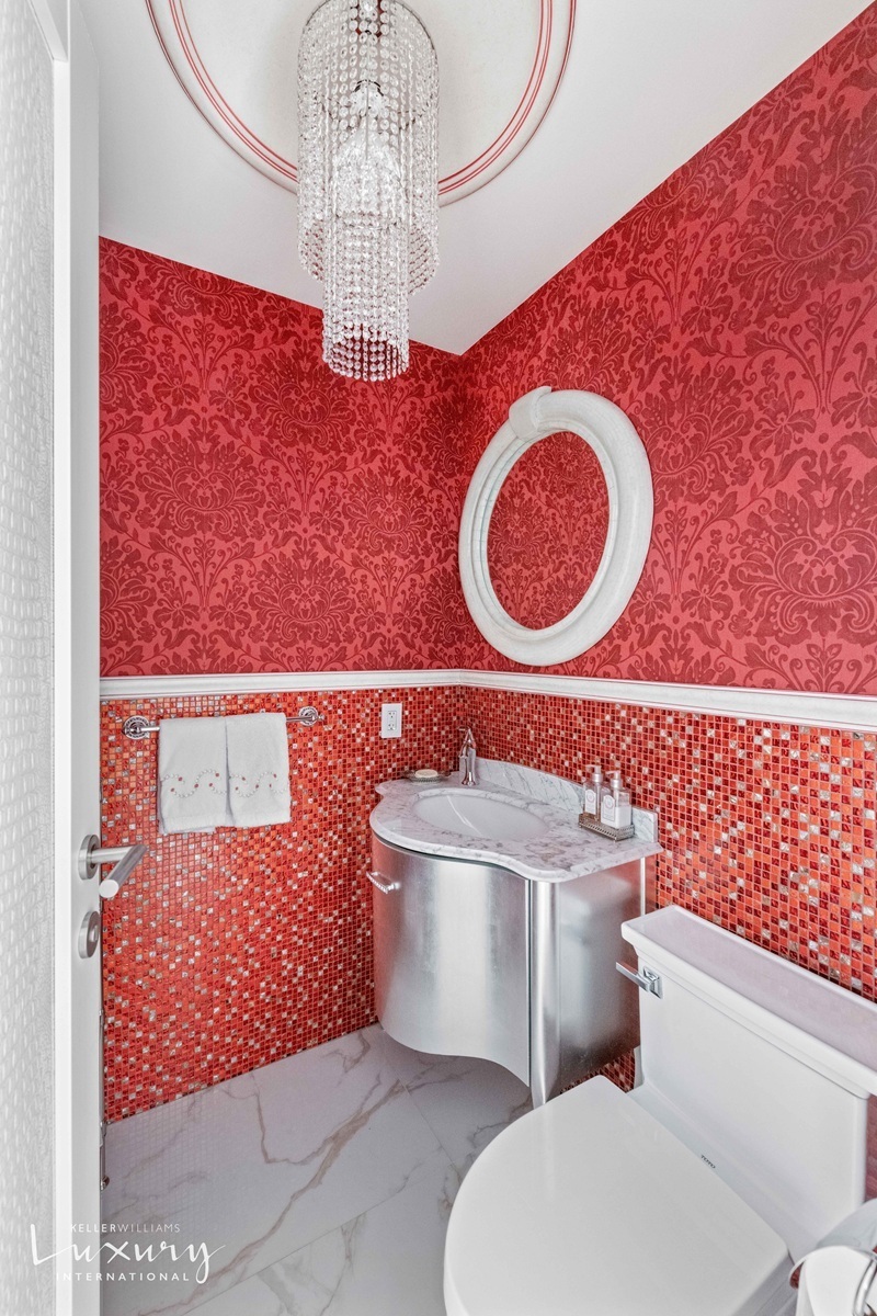 Undisclosed Address Manhattan, NY 10022 - Photo 14 of 16 a bathroom with a toilet and a sink