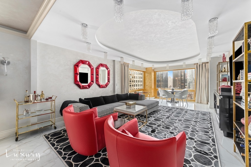 Undisclosed Address Manhattan, NY 10022 - Photo 2 of 16 a living room with furniture and a flat screen tv