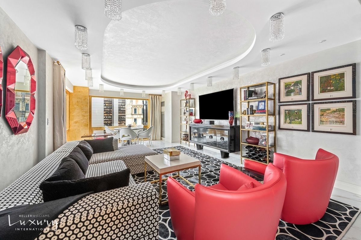 Undisclosed Address Manhattan, NY 10022 - Photo 3 of 16 a living room with furniture workspace and a flat screen tv