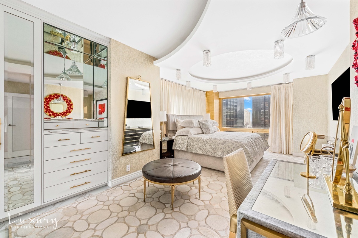 Undisclosed Address Manhattan, NY 10022 - Photo 8 of 16 a living room with furniture and a flat screen tv