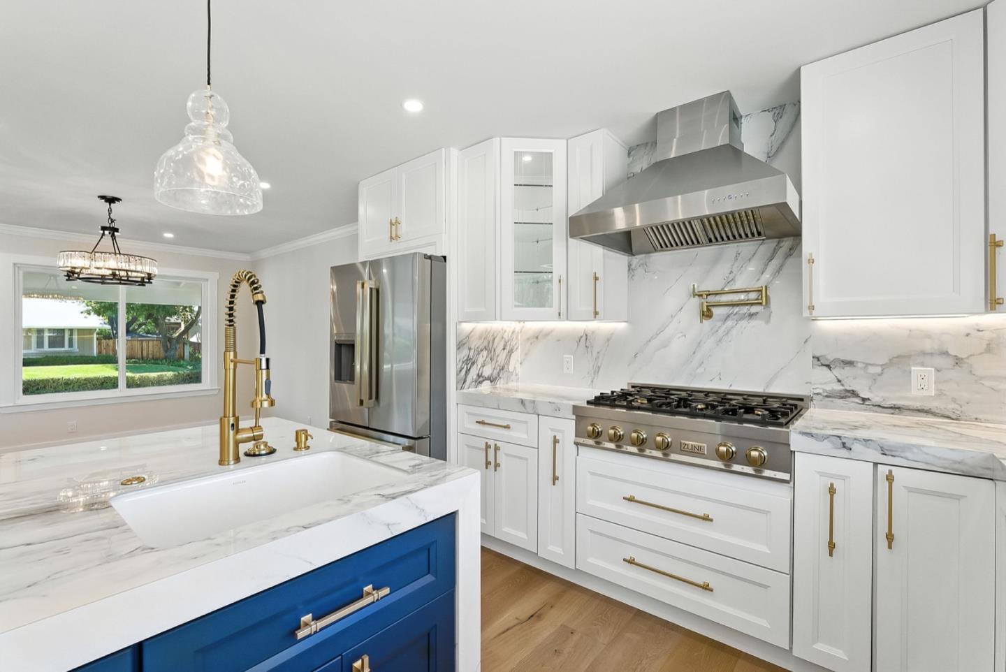 5701 Lewis Way Concord, CA 94521 - Photo 12 of 54 a kitchen with stainless steel appliances granite countertop a sink stove and refrigerator