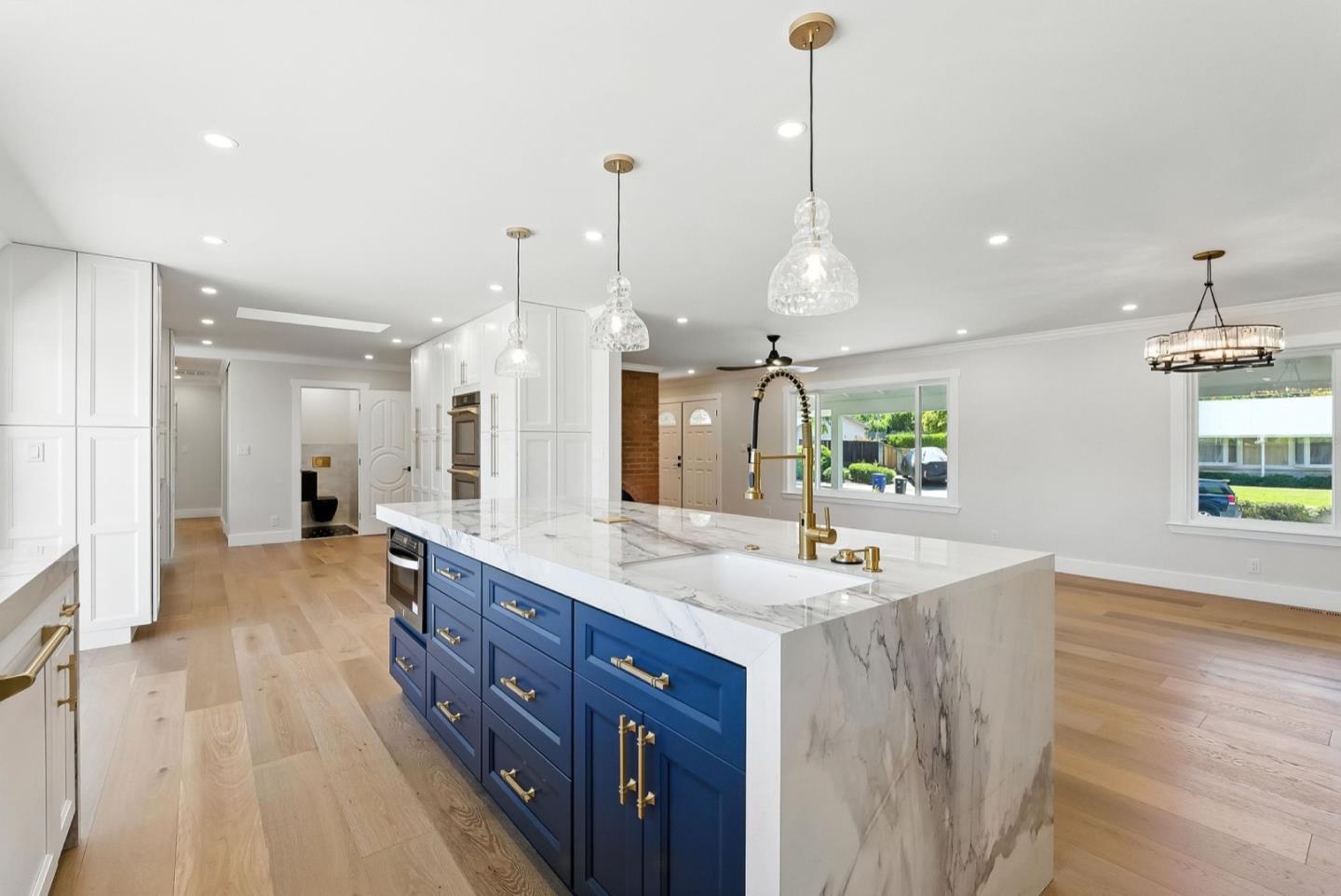 5701 Lewis Way Concord, CA 94521 - Photo 15 of 54 a bathroom with a sink a large mirror and a shower