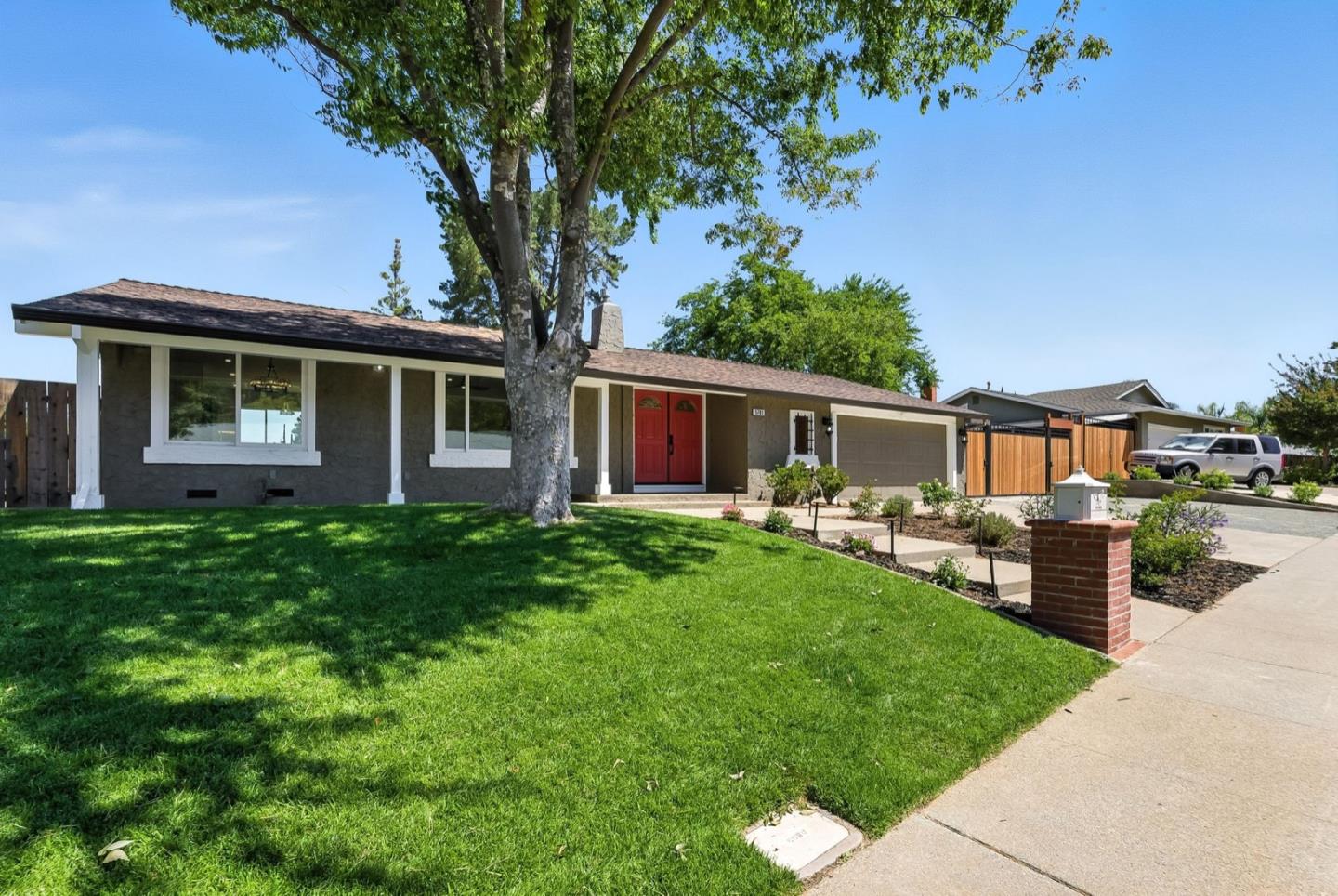 5701 Lewis Way Concord, CA 94521 - Photo 2 of 54 a front view of house with yard and green space